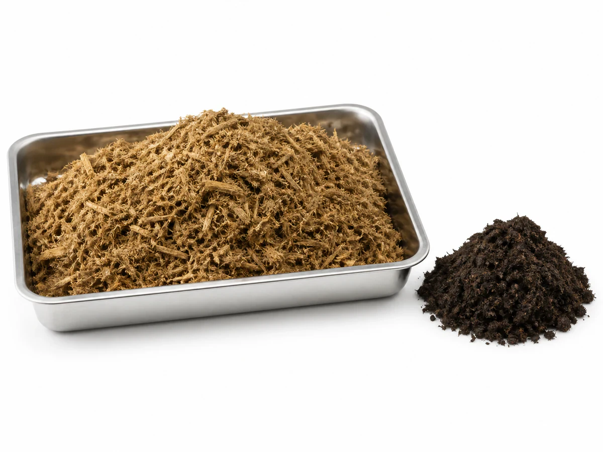 Shredded brown empty fruit bunch fibre alongside dark palm compost